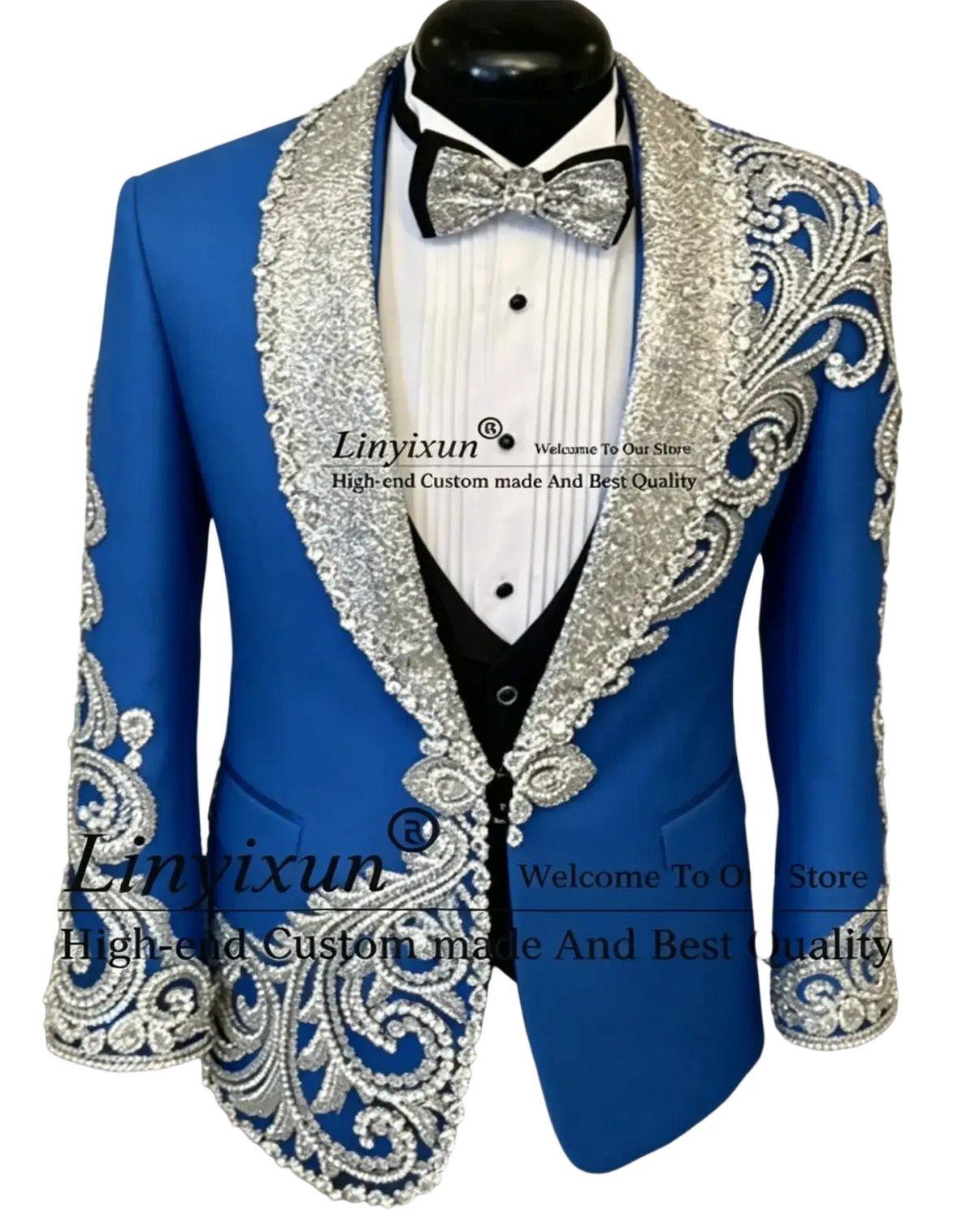 Vibrant blue velvet tuxedo jacket with silver beaded embroidery on lapels, shoulders, and cuffs for men weddings
