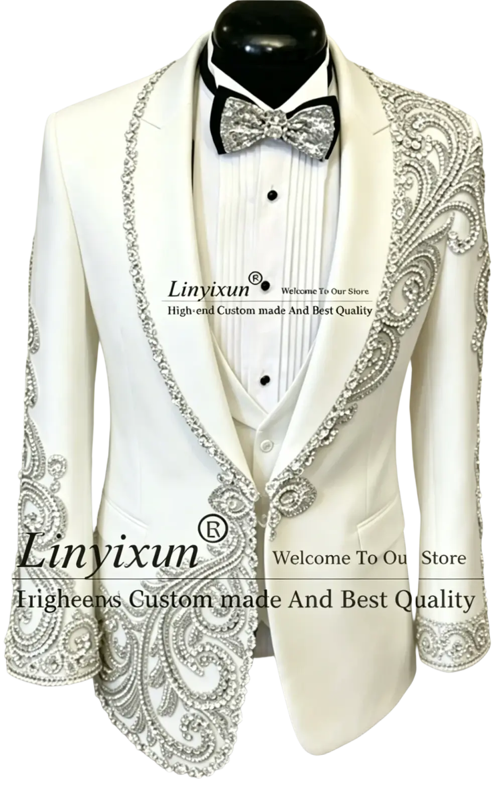 White tuxedo jacket with silver beaded paisley embroidery on lapels shoulders and cuffs in black velvet men wedding suit
