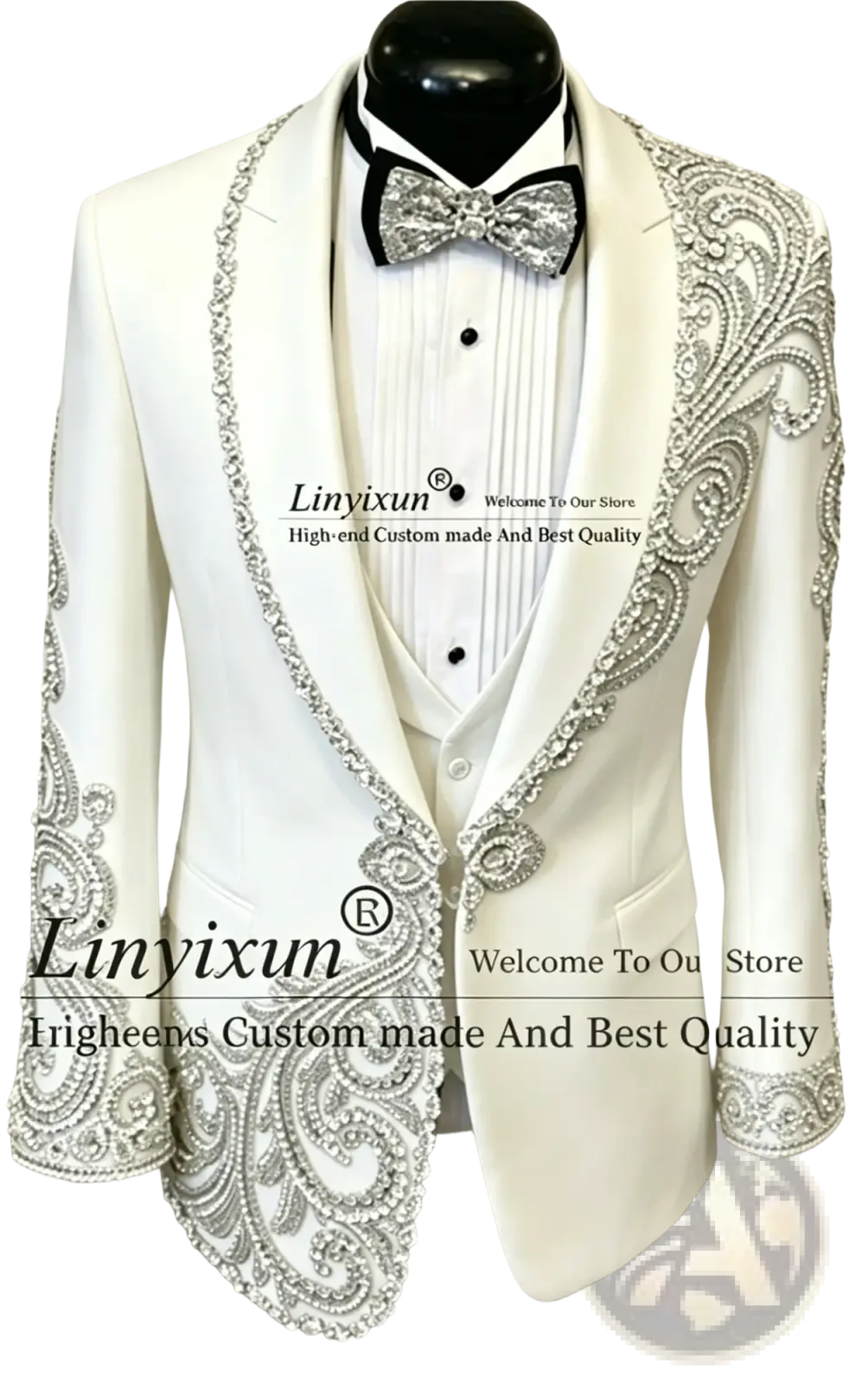 White tuxedo jacket with silver beaded paisley embroidery on lapels shoulders and cuffs in black velvet men wedding suit