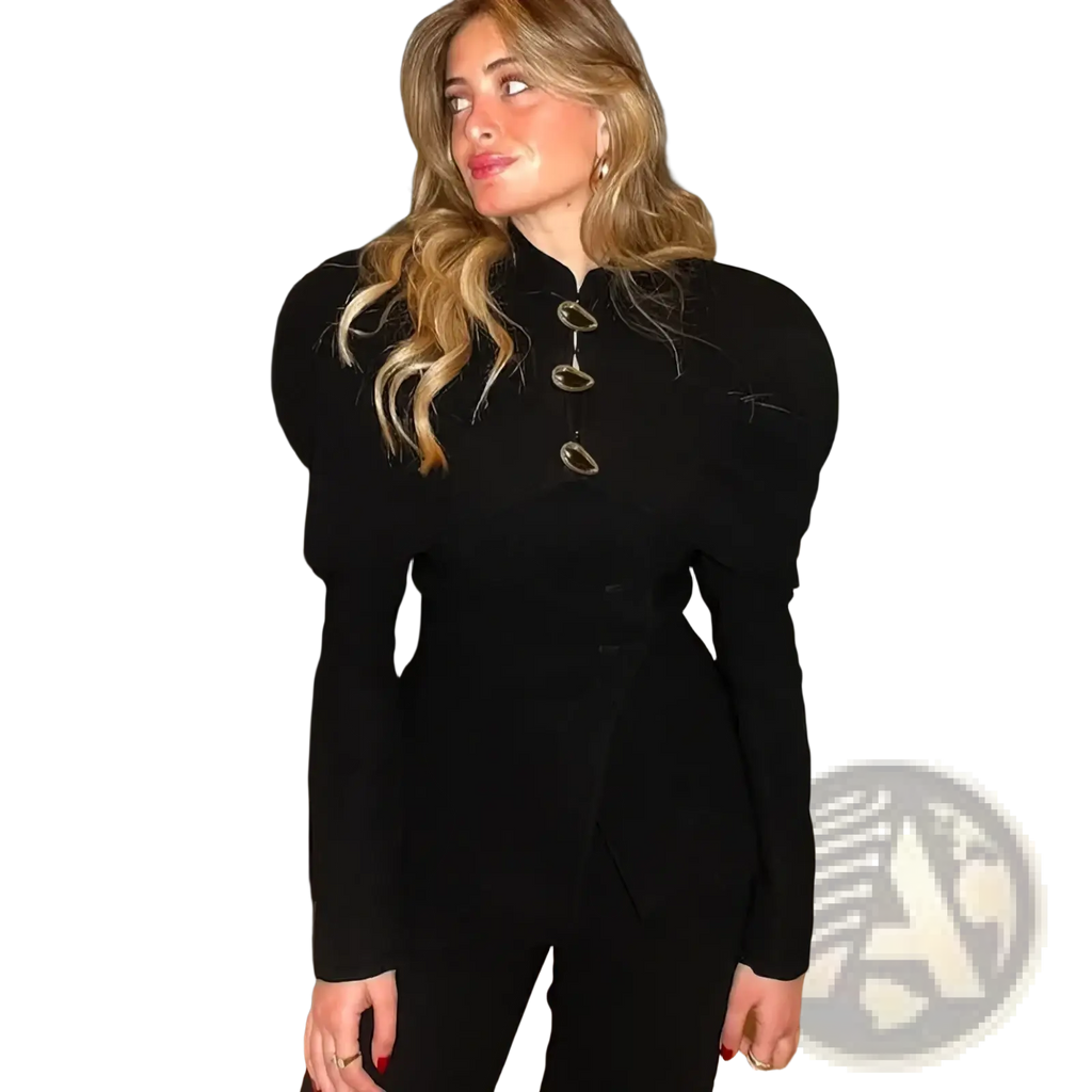 Black velvet fitted blazer with dramatic puffed shoulders and gold oval buttons down the front