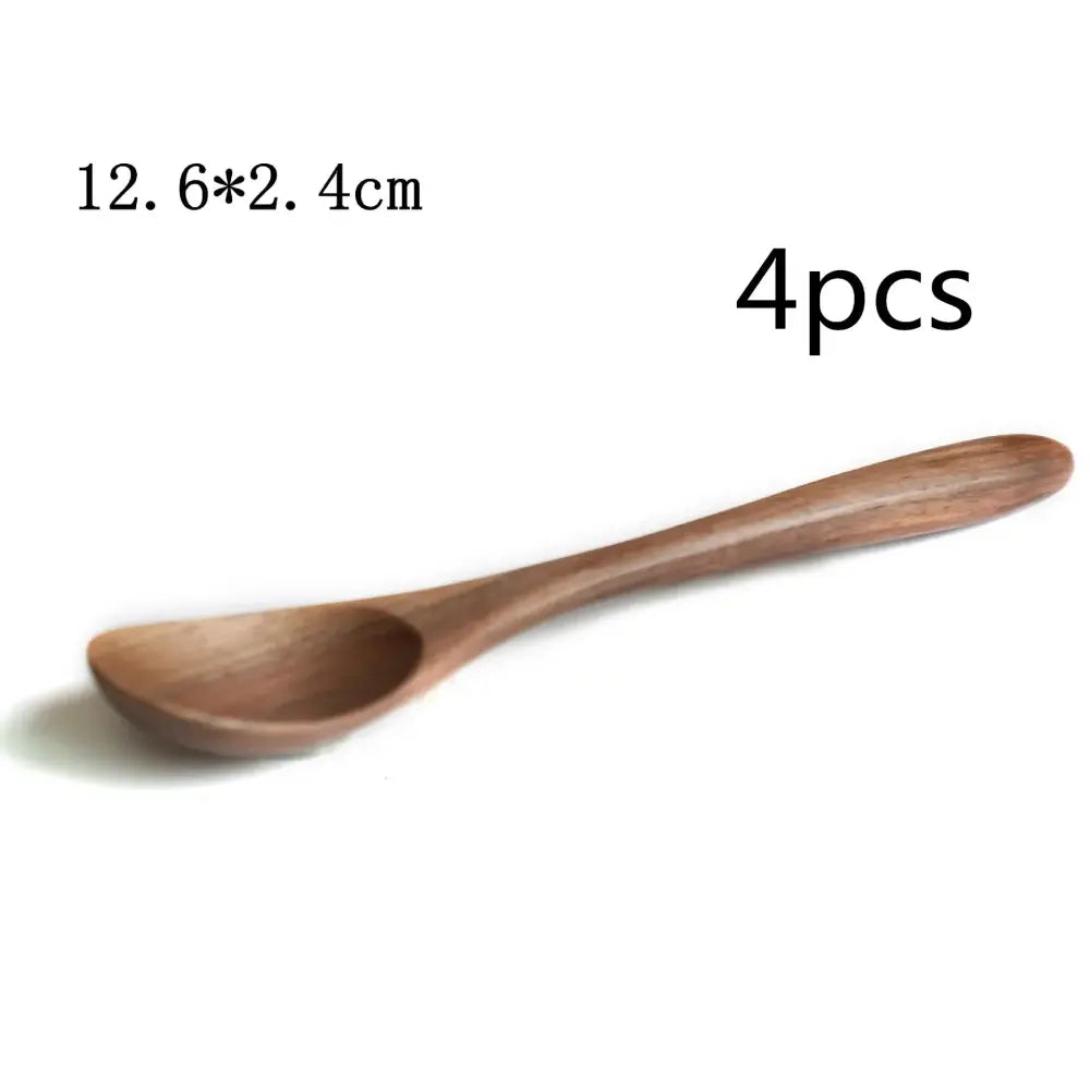 A smooth light brown wooden spoon with a curved handle from the handcrafted black walnut wood dining spoon set