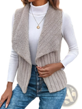 A cozy light gray shearling vest with ribbed knit front and draped collar for stylish knit outerwear