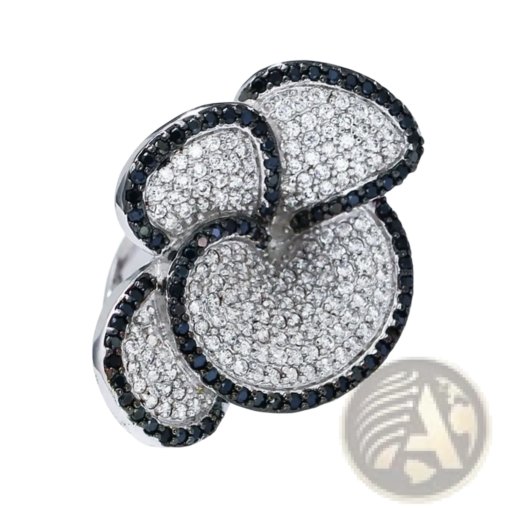 Black and white crystal statement flower ring with bold multi-layered pavé white and black diamonds on silver metal
