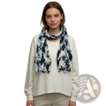 Black and white floral crinkle chiffon scarf with lightweight flowing fabric draped around the neck