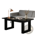 Black wooden office desk with sturdy rectangular legs and a smooth dark-finished surface for modern minimalist use