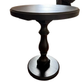 Black wooden pedestal round accent table with a smooth matte-finished wooden top and base