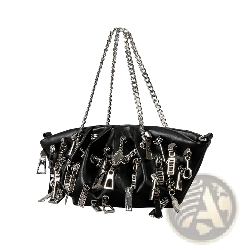 Black Y2k punk shoulder bag in black leather with silver-toned zipper pulls and matching chain strap