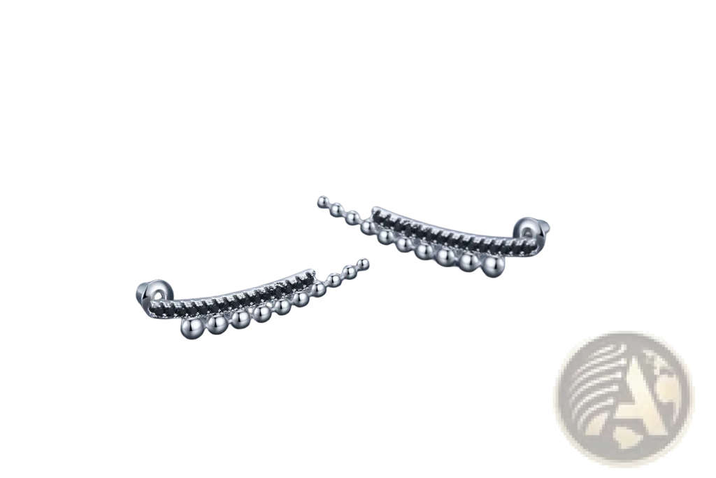 Silver-toned ear cuffs with sleek curved design and beaded textured detailing in black zircon and silver beaded cascading drop earrings