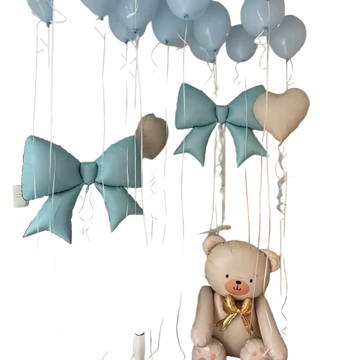 A plush beige teddy bear with a golden bow in the blue bear and bow balloon party set for balloon party decor
