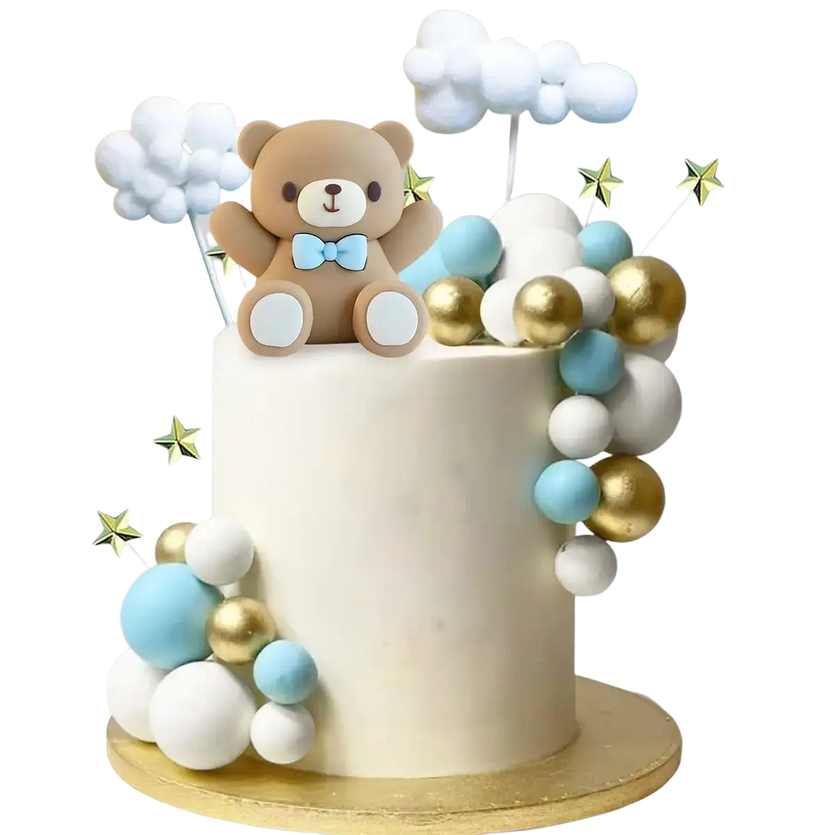 A beige teddy bear cake topper with a light blue bow tie sitting on a cloud and colorful spheres decorated cake