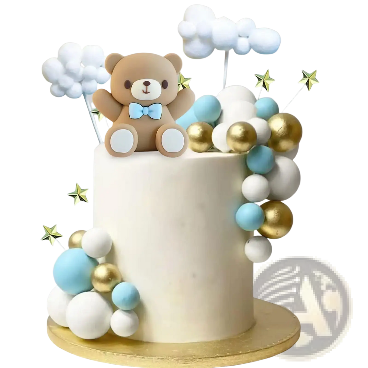 A beige teddy bear cake topper with a light blue bow tie sitting on a cloud and colorful spheres decorated cake