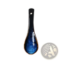 A sleek glossy blue ceramic spoon rest with white swirls and a black handle designed for porcelain tableware use