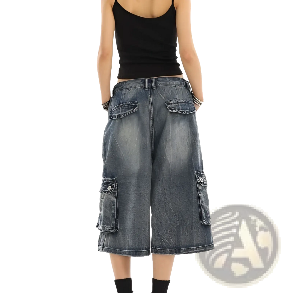 Wide-leg blue denim cargo shorts in faded wash with multiple buttoned flap pockets for streetwear style