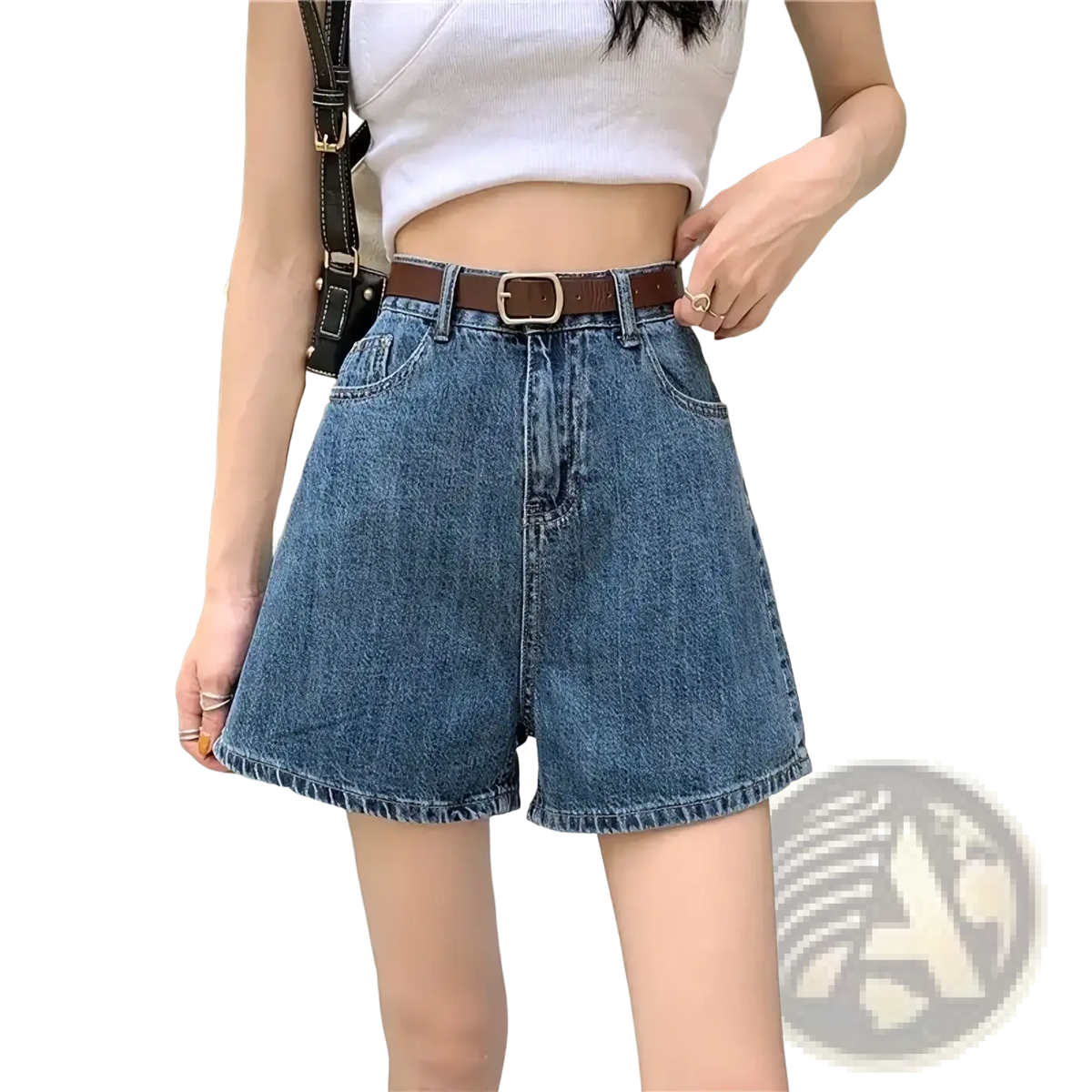 Blue denim high waisted shorts in medium wash with frayed hems and a brown leather belt visible from front view