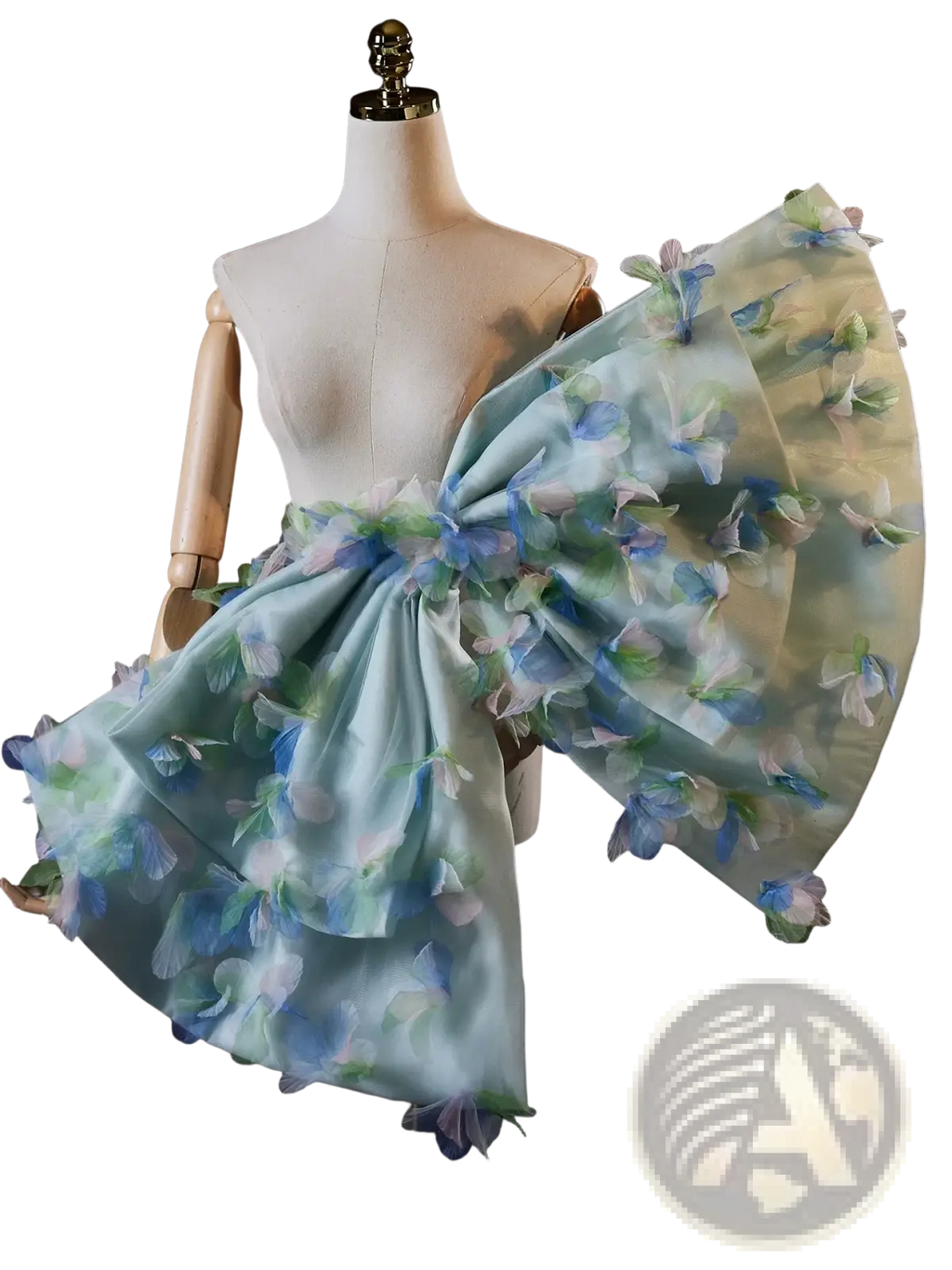 A delicate light blue floral bridal bow evening party accessory with sheer layered fabric and three-dimensional flower appliqués