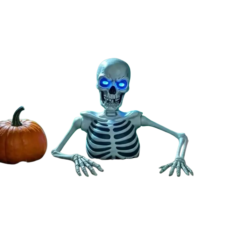 Blue glowing eyes half skeleton halloween prop featuring a glowing blue-eyed plastic skeleton between pumpkins