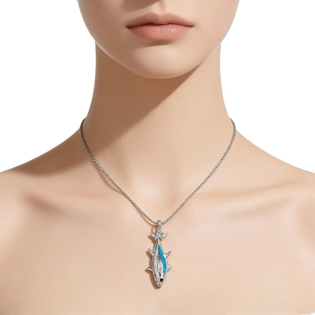 Silver fish-shaped pendant necklace with vibrant blue enamel stripe and sparkling gemstone accents from Blue Opal Ocean Jewelry