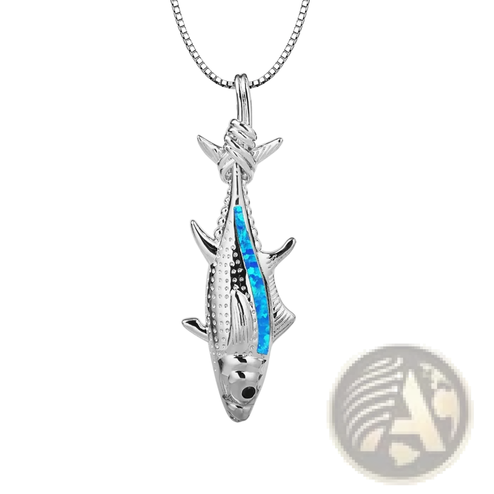 Silver fish-shaped pendant necklace with vibrant blue opal inlay on a matching silver chain ocean jewelry design