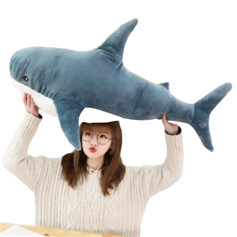 Blue shark stuffed animal plush pillow with soft velvety texture and black embroidered eyes