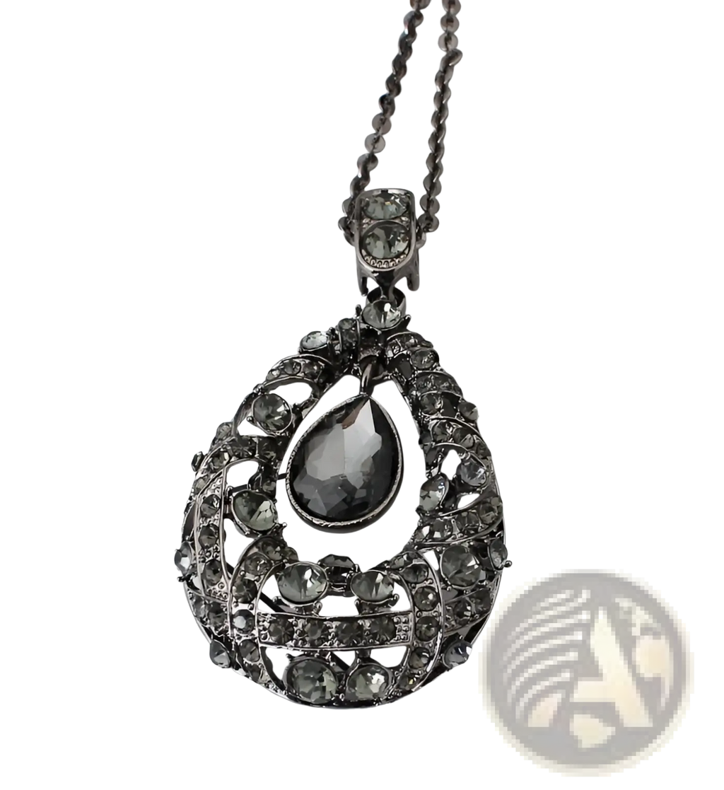 An ornate black rhinestone pendant necklace with teardrop centerpiece and intricate filigree design on sweater chain