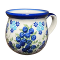 A white ceramic fermentation and pickling mug with blue rim and handle hand-painted with blueberries and flowers