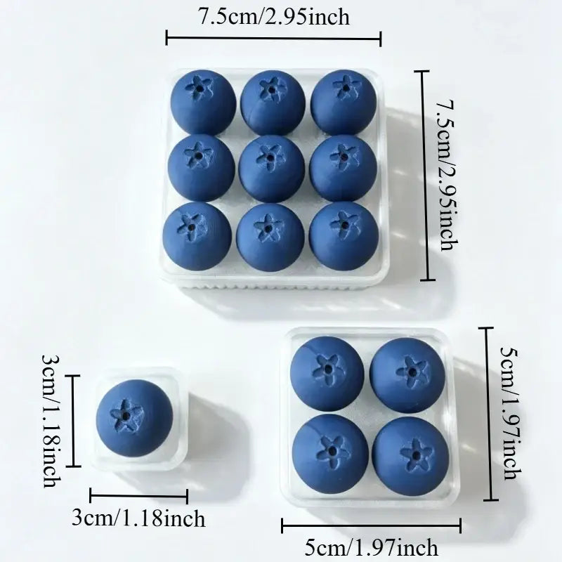 Blue silicone blueberry-shaped ice cube trays designed as a fidget toy for stress relief and sensory play