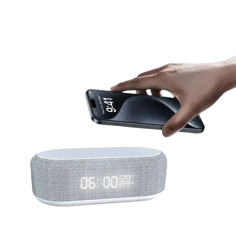 Gray fabric bluetooth speaker with white digital display and wireless charging function in power saving mode