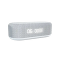 Gray fabric bluetooth speaker with wireless charging function and white digital display showing time and temperature