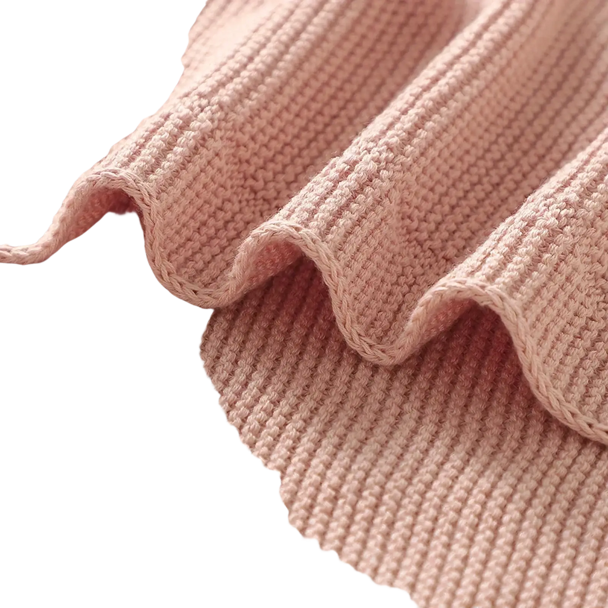 Blush pink knitted baby blanket made of soft ribbed cotton fabric with a gentle wavy edge for receiving use