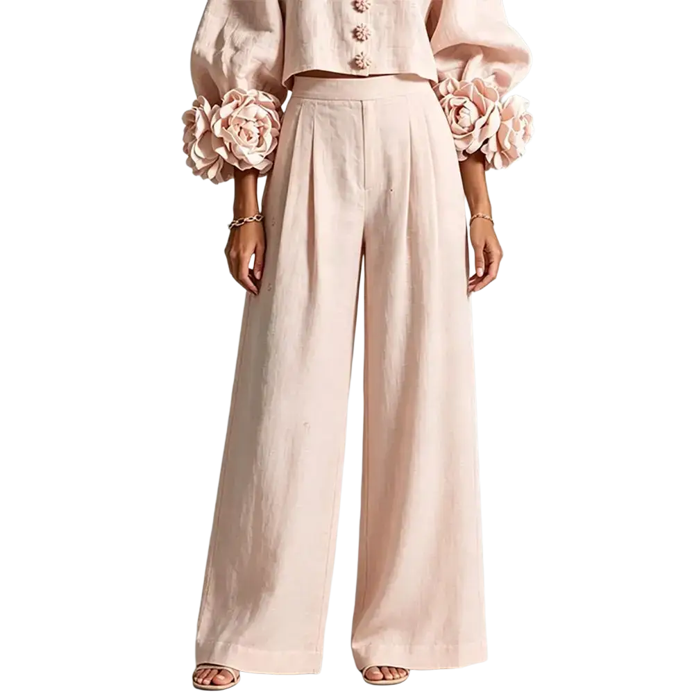 A pair of blush pink linen wide leg pants with high waist pleats and concealed closure type detail