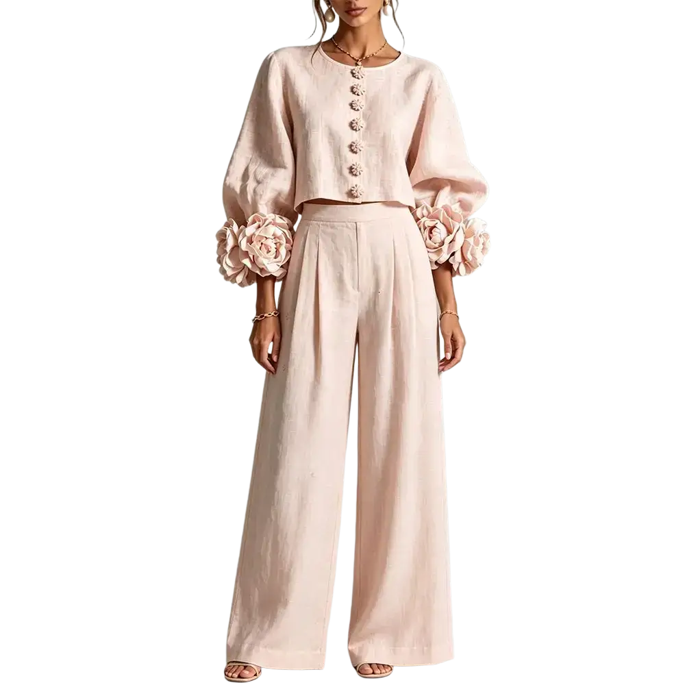 Blush pink linen two-piece set with puff sleeve cropped top and wide leg pants featuring button closure type