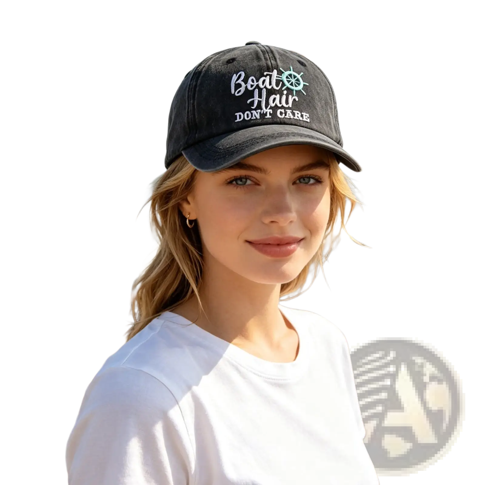Black baseball cap with white and teal embroidered boat hair dont care text and small ships wheel design