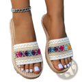 Beige woven espadrille bohemian beaded flat sandals with white embroidered strap and colorful sequined accents