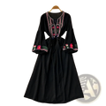 Bohemian embroidered long sleeve black dress with vibrant pink and green floral patterns on neckline cuffs and front panel