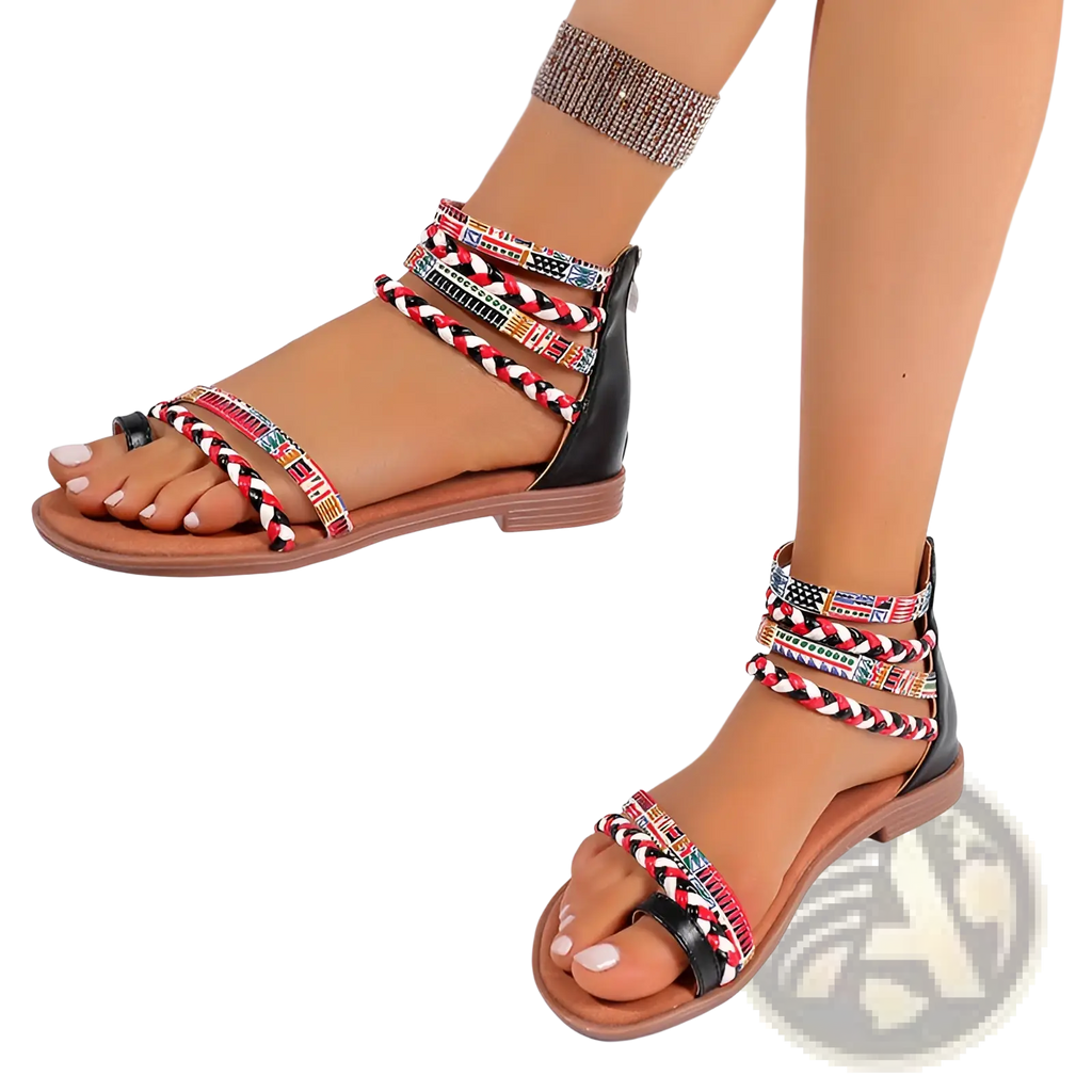 Black and tan strappy flat sandals with colorful braided ethnic ankle straps featuring a bohemian design