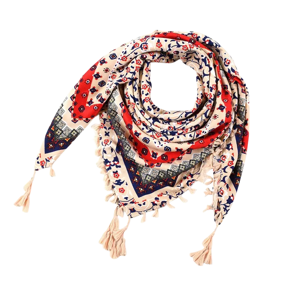 A cream-colored bohemian floral square scarf with vibrant red navy blue black patterns and soft beige tassels