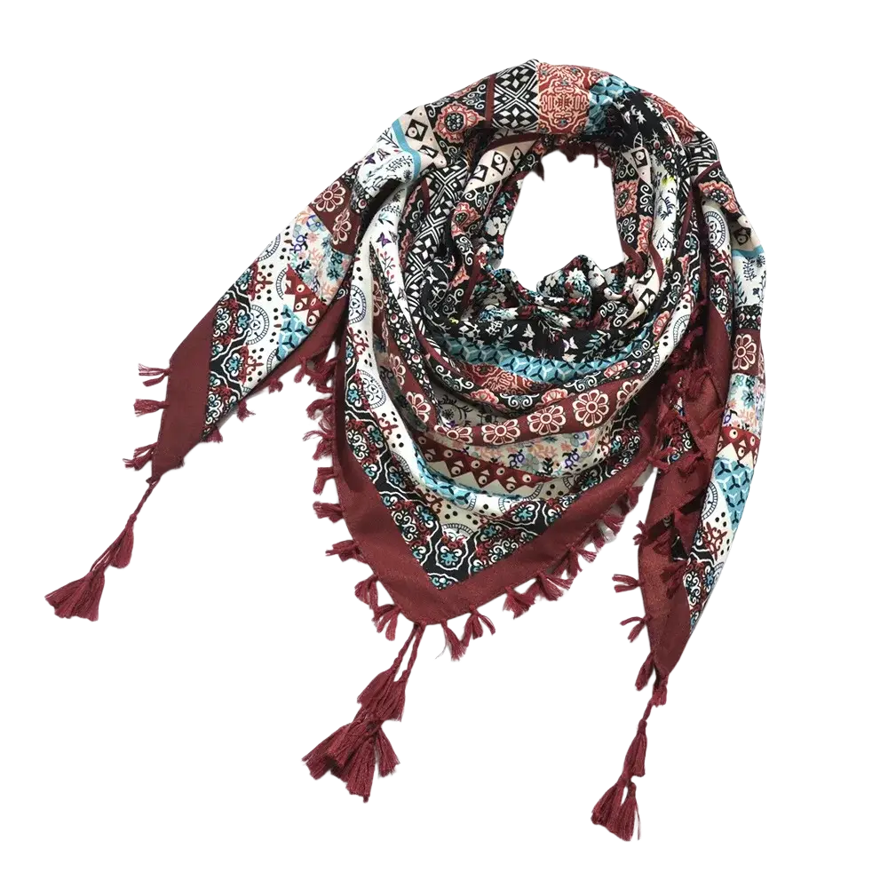 A bohemian floral square scarf tassel shawl in maroon and black with patterned fabric and tassels along the edges
