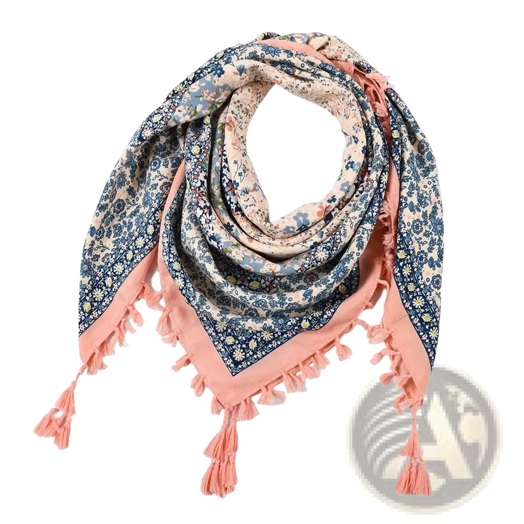 A soft peach-colored bohemian floral square scarf with delicate blue and white flowers and fringed tassel edges