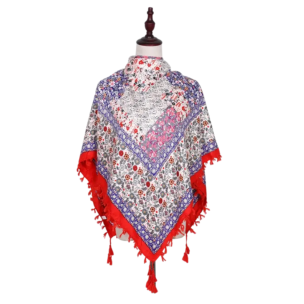 A vibrant bohemian floral square scarf tassel shawl in white red and blue with tassel trim