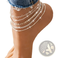 Silver multi-layered anklet with heart and leaf chain designs worn on foot from bohemian gold heart and leaf layered anklet set