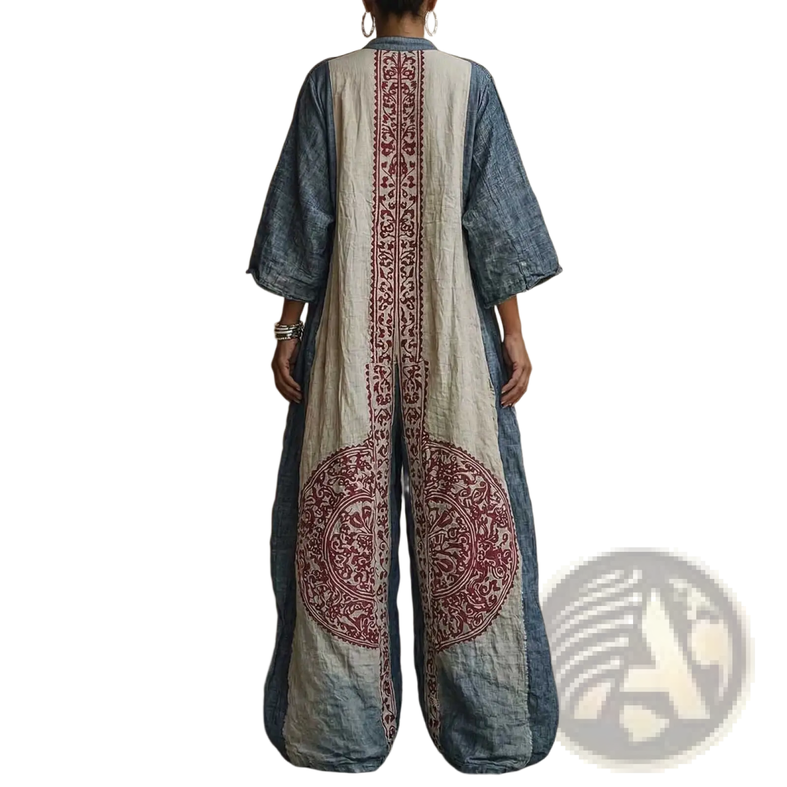 A back view of a long flowing denim and cream robe with red embroidered patterns featured with bohemian printed wide leg pants