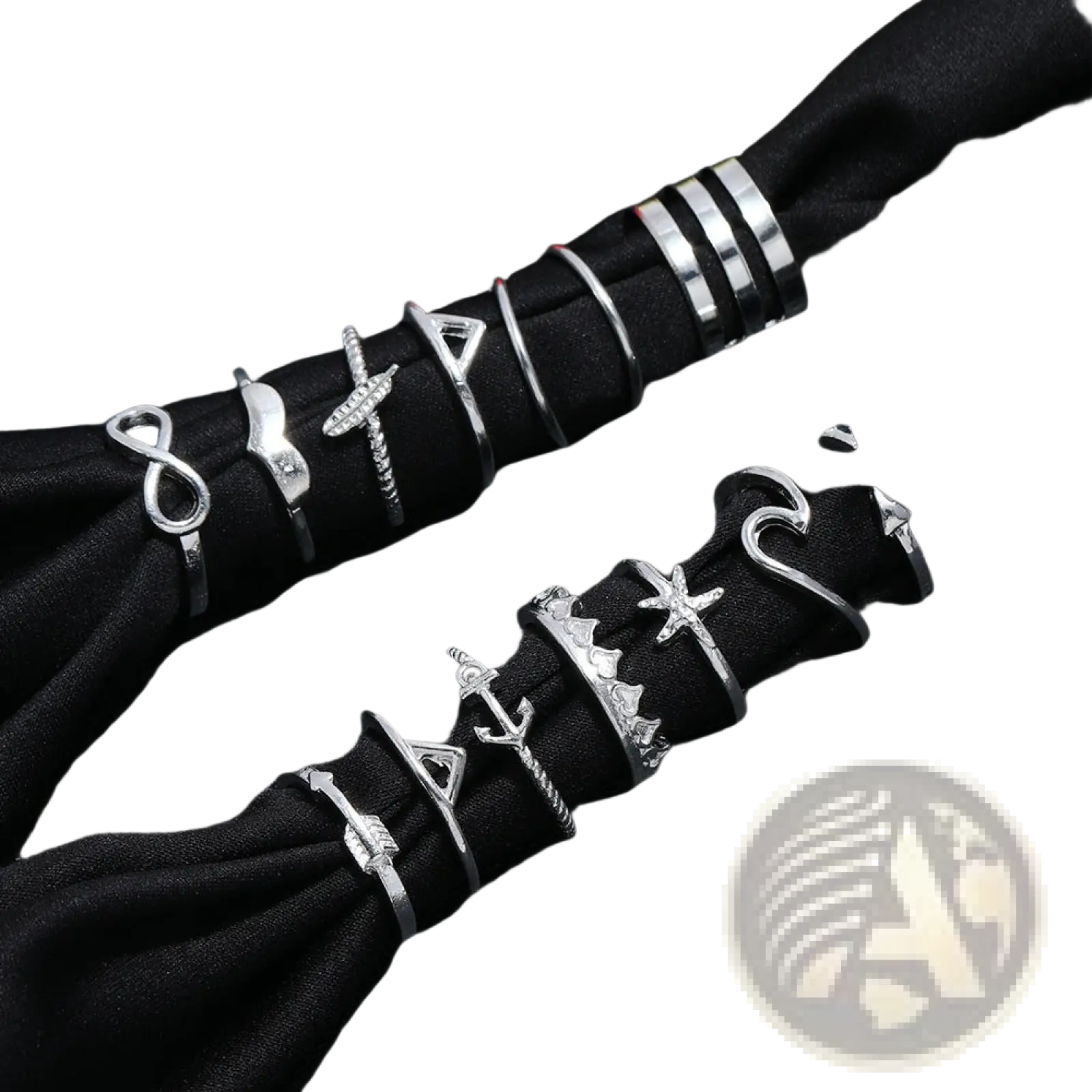 Bohemian silver mixed motif stackable ring set featuring silver-toned metal rings with infinity, anchor, star, and arrow designs