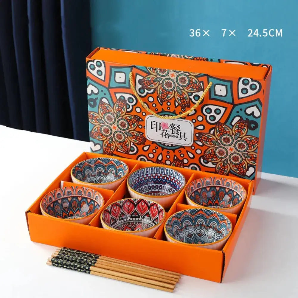 Set of six vibrant ceramic bowls with intricate mandala patterns in an orange gift box for bohemian decor