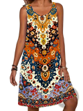 A vibrant sleeveless boho beach dress with bold multi-colored paisley and floral pattern for summer vacation
