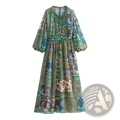 A flowing long-sleeved maxi dress with vibrant green blue floral patchwork on lightweight chiffon fabric