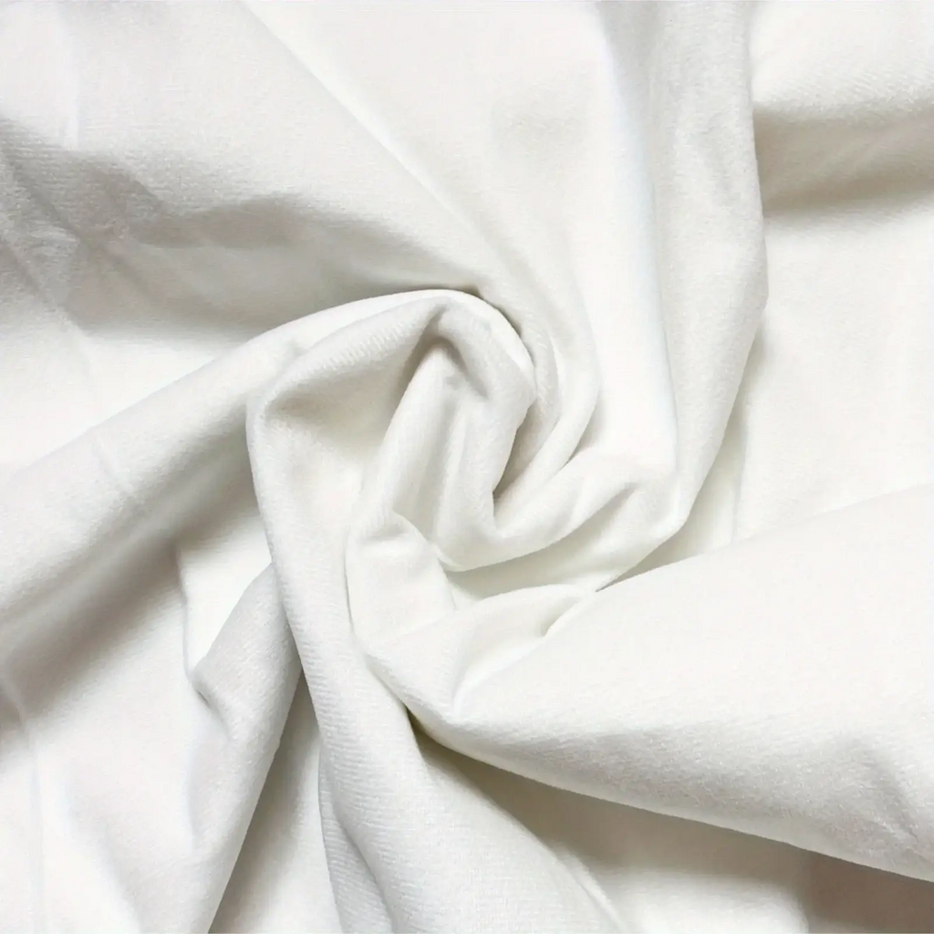 Boho geometric throw pillow covers set of 4 made of white soft cotton fabric with subtle texture and gentle folds