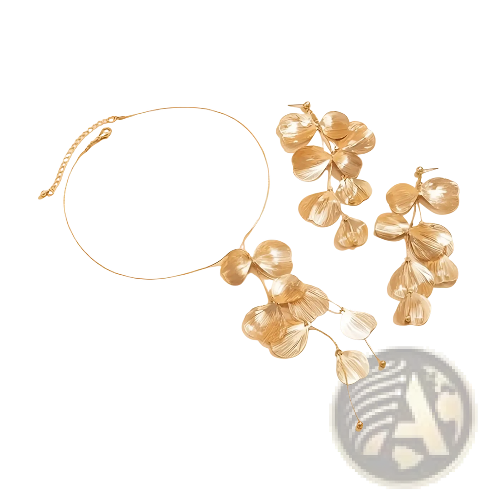 Boho gold ginkgo leaf tassel necklace and earrings set with gold-toned layered petal designs and delicate details