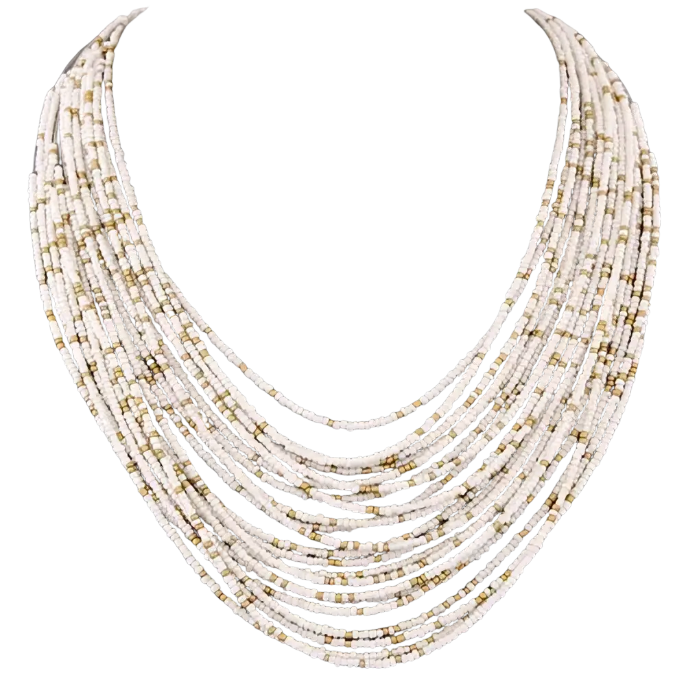 Boho multi-layer bead statement necklace with delicate white and gold-toned beads in a cascading design