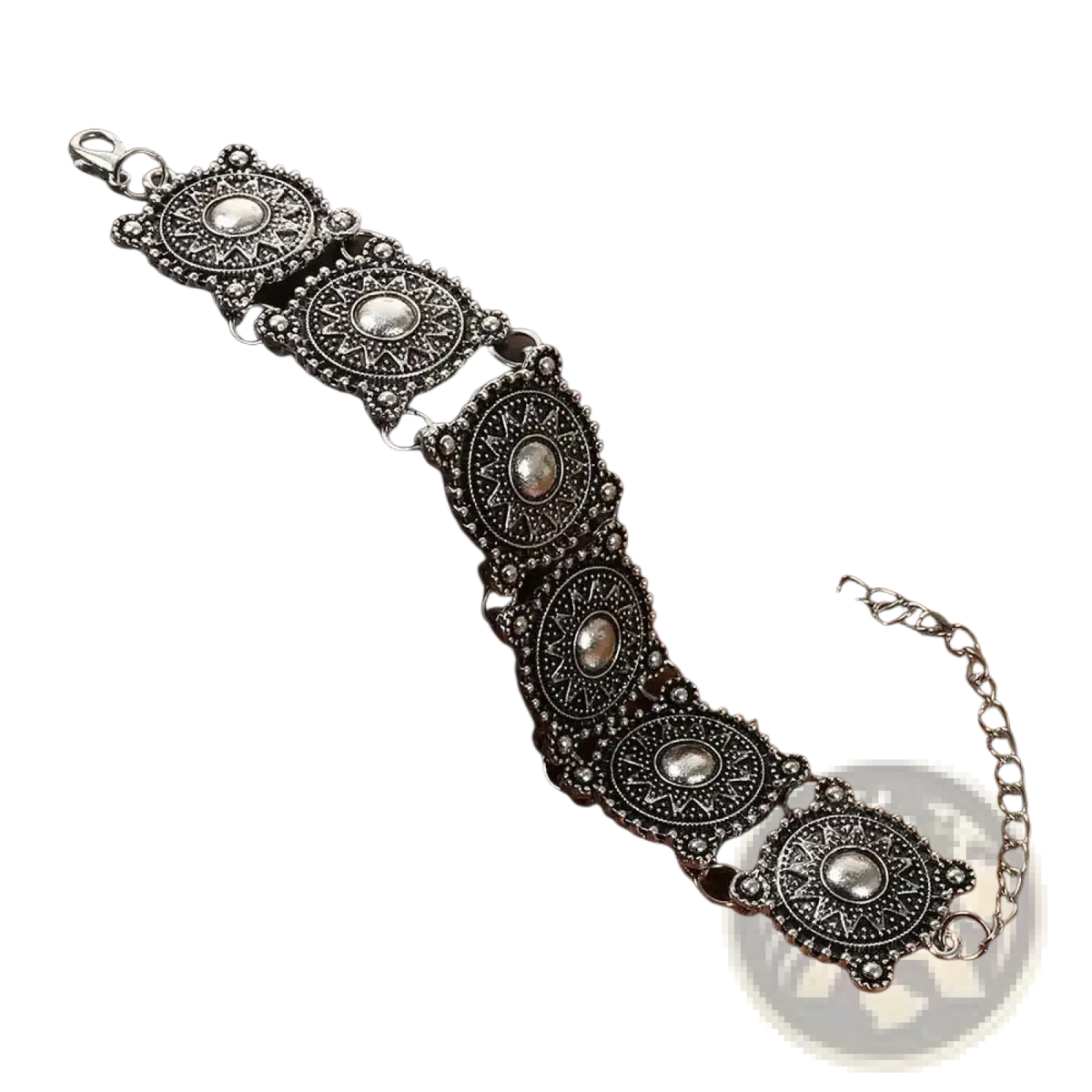 Antique silver-toned boho bracelet with intricate geometric and floral patterns and central oval embellishments