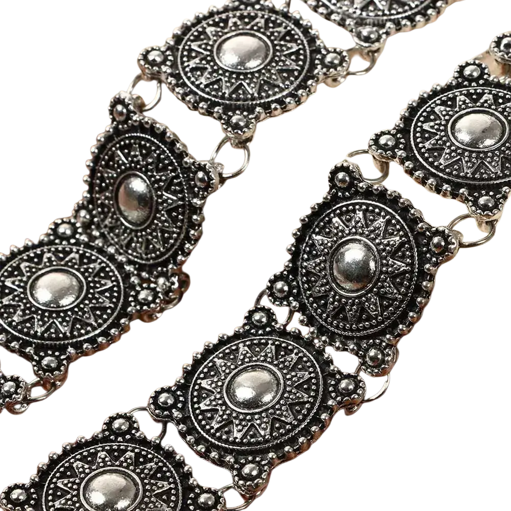 Boho silver vintage jewelry set featuring a silver-toned metal belt chain with intricate sunburst patterns and beaded edges
